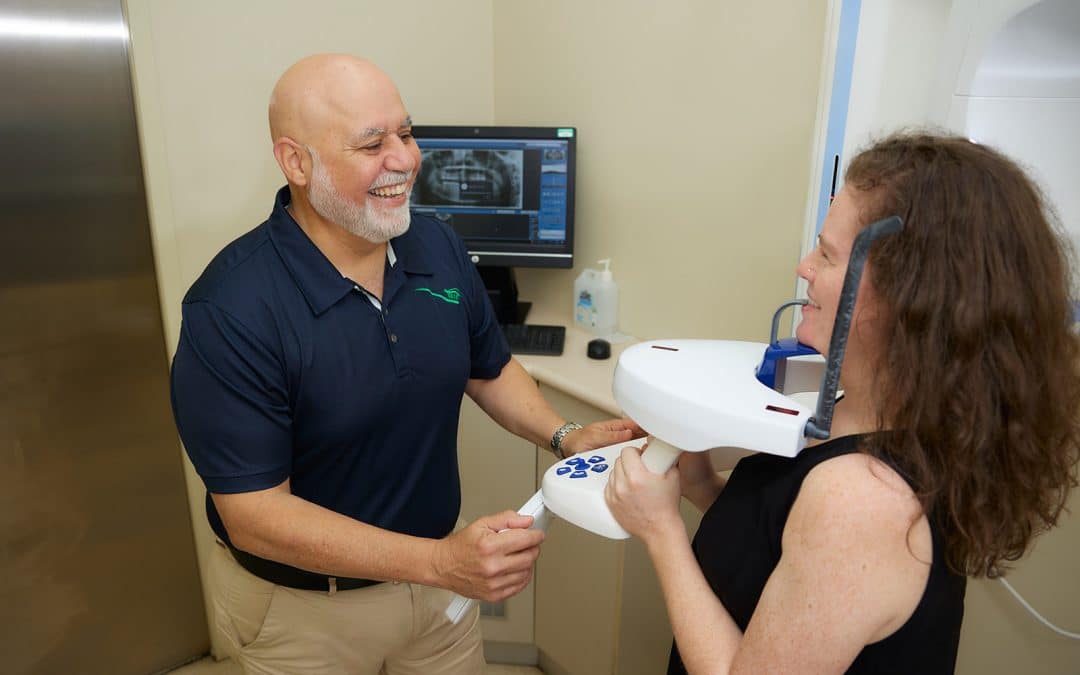Dentist checking patient's teeth